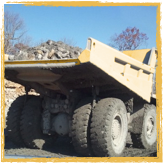 Dump Truck hauling rock at a quarry
